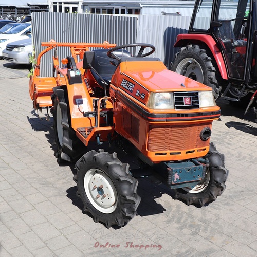 Мінітрактор Kubota B1 14 з фрезою, був у використанні, помаранчевий