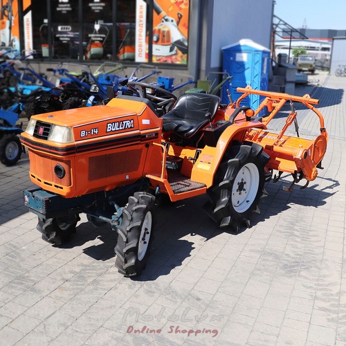 Мінітрактор Kubota B1 14 з фрезою, був у використанні, помаранчевий