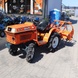 Мінітрактор Kubota B1 14 з фрезою, був у використанні, помаранчевий