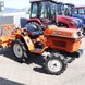 Мінітрактор Kubota B1 14 з фрезою, був у використанні, помаранчевий